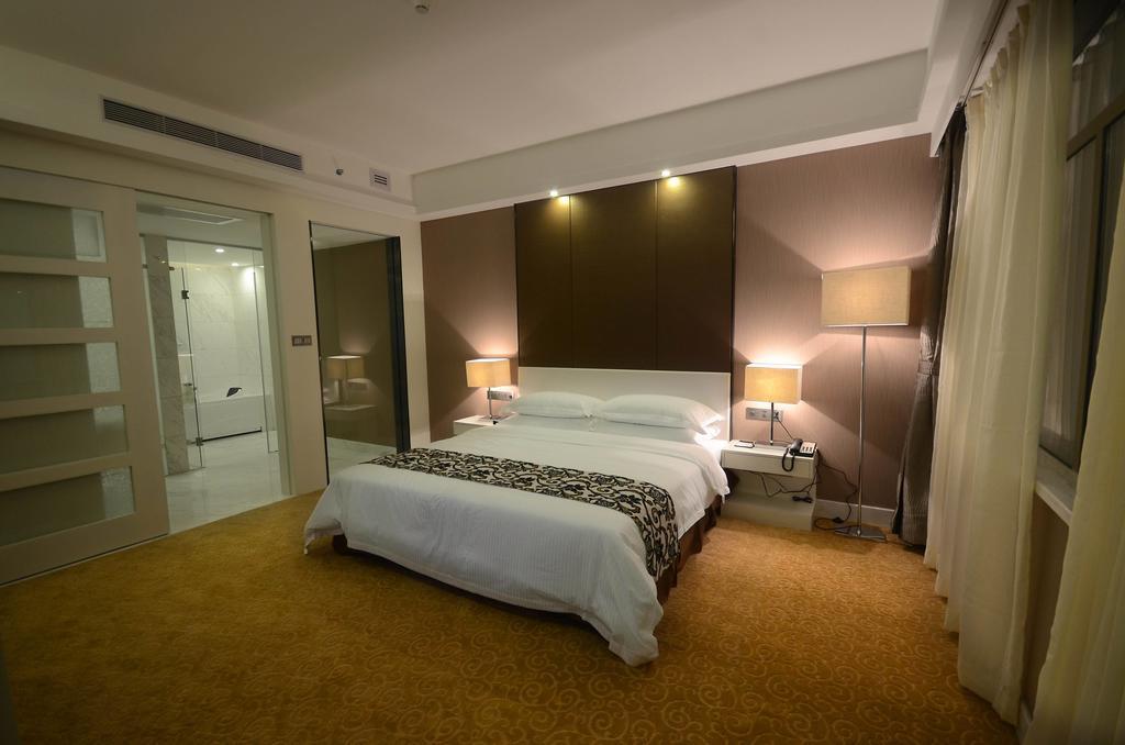 Dongguan Junyue Hotel Rum bild