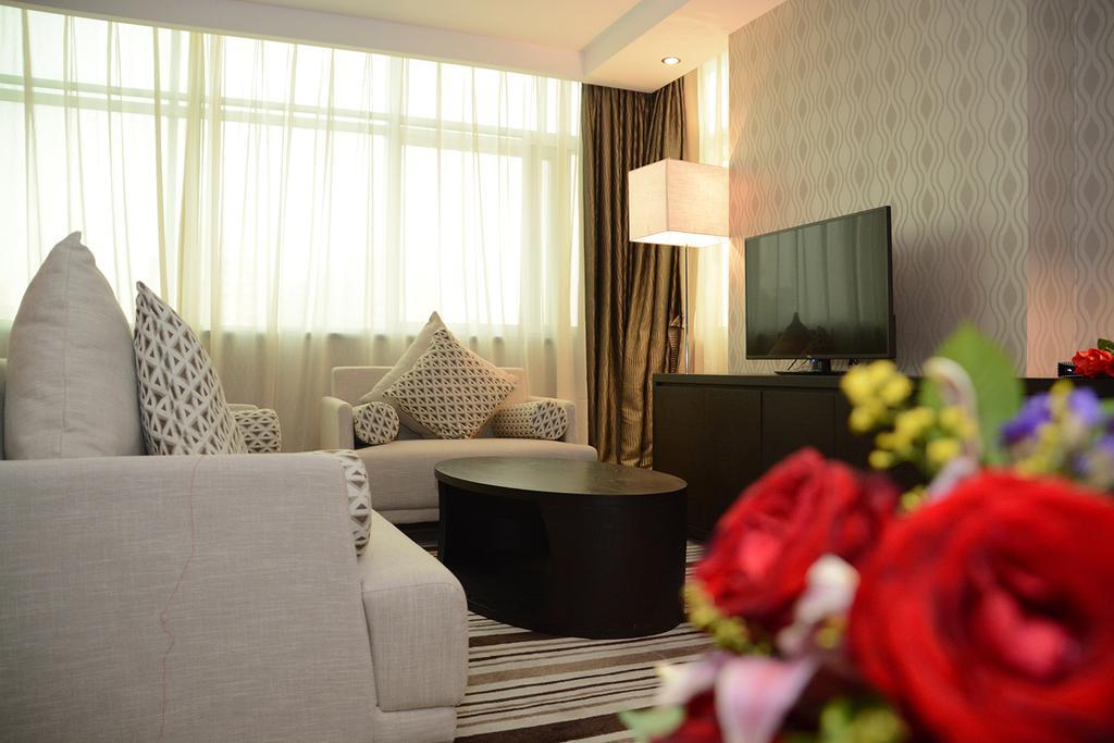 Dongguan Junyue Hotel Rum bild
