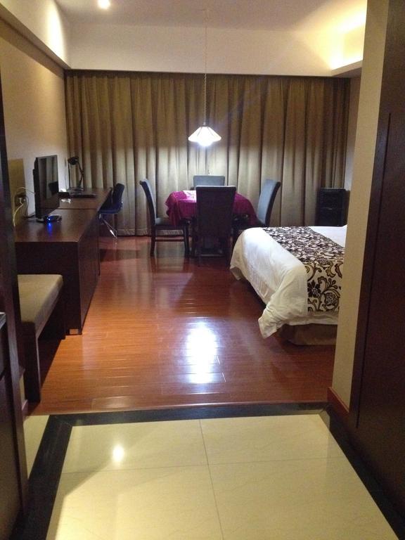Dongguan Junyue Hotel Rum bild