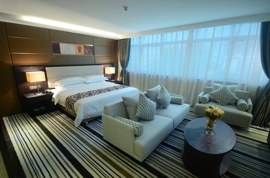 Dongguan Junyue Hotel Rum bild