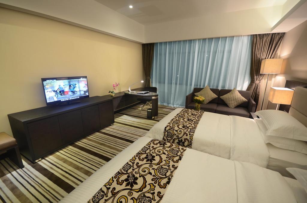 Dongguan Junyue Hotel Rum bild