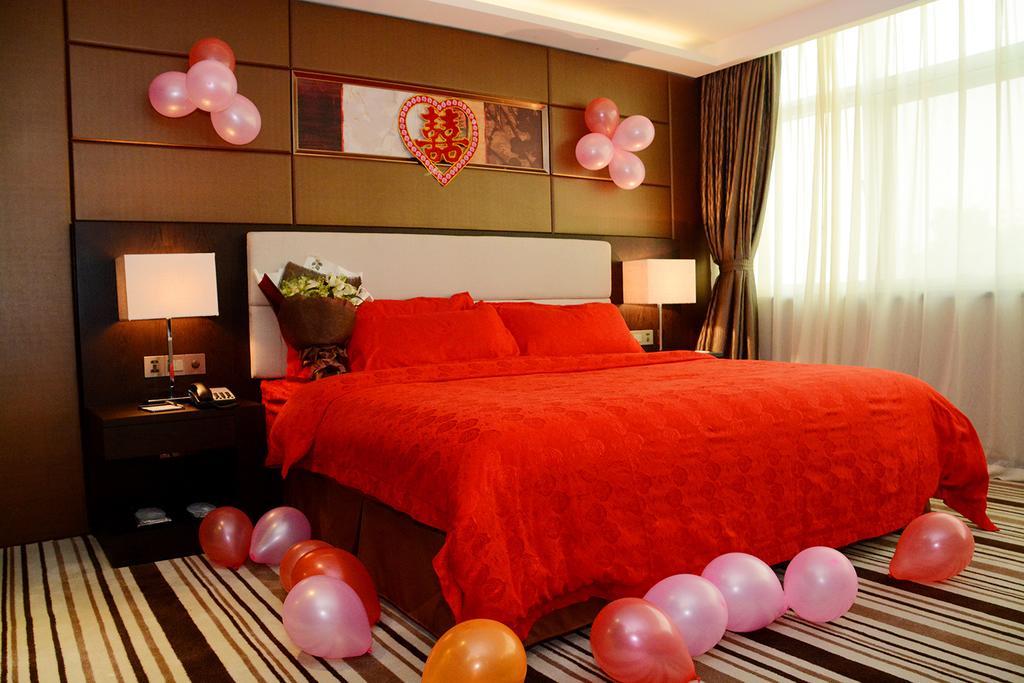 Dongguan Junyue Hotel Rum bild