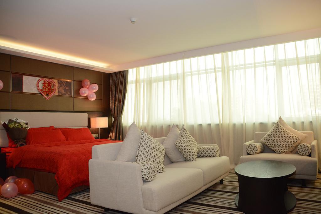 Dongguan Junyue Hotel Rum bild