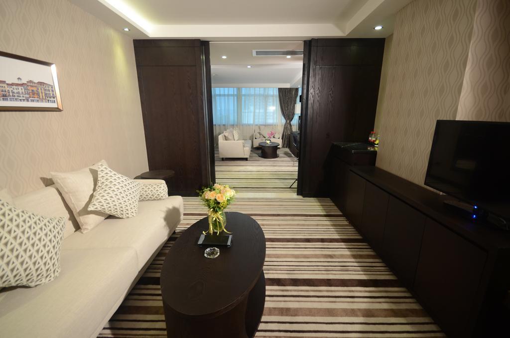Dongguan Junyue Hotel Rum bild