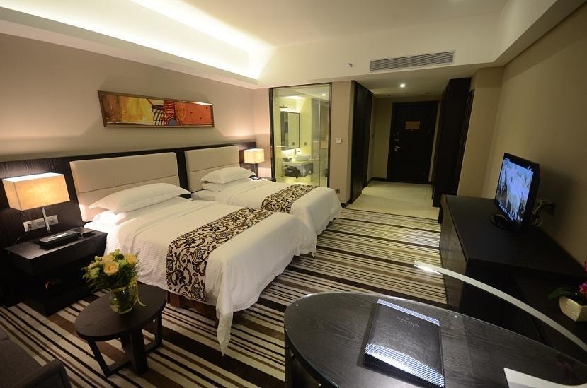 Dongguan Junyue Hotel Rum bild